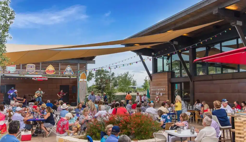 Live music night outside Independence Hall — Kissing Tree’s community social hub in San Marcos, Texas