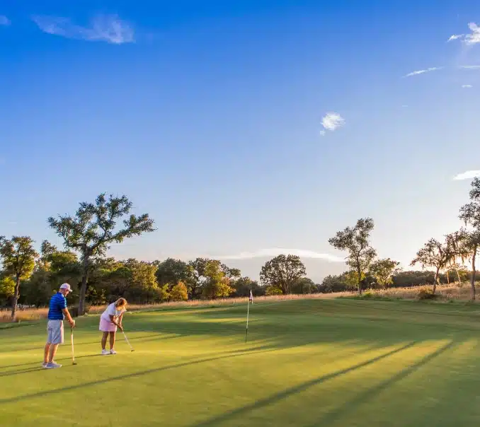 people playing golf at kissing tree, san marcos, tx