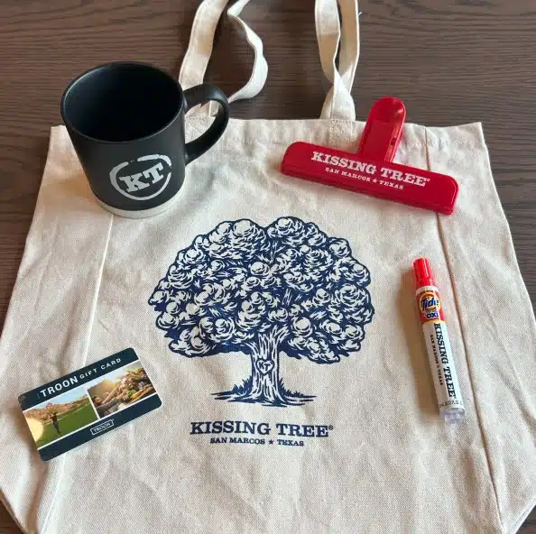 kissing tree bag and coffee mug agent goodies