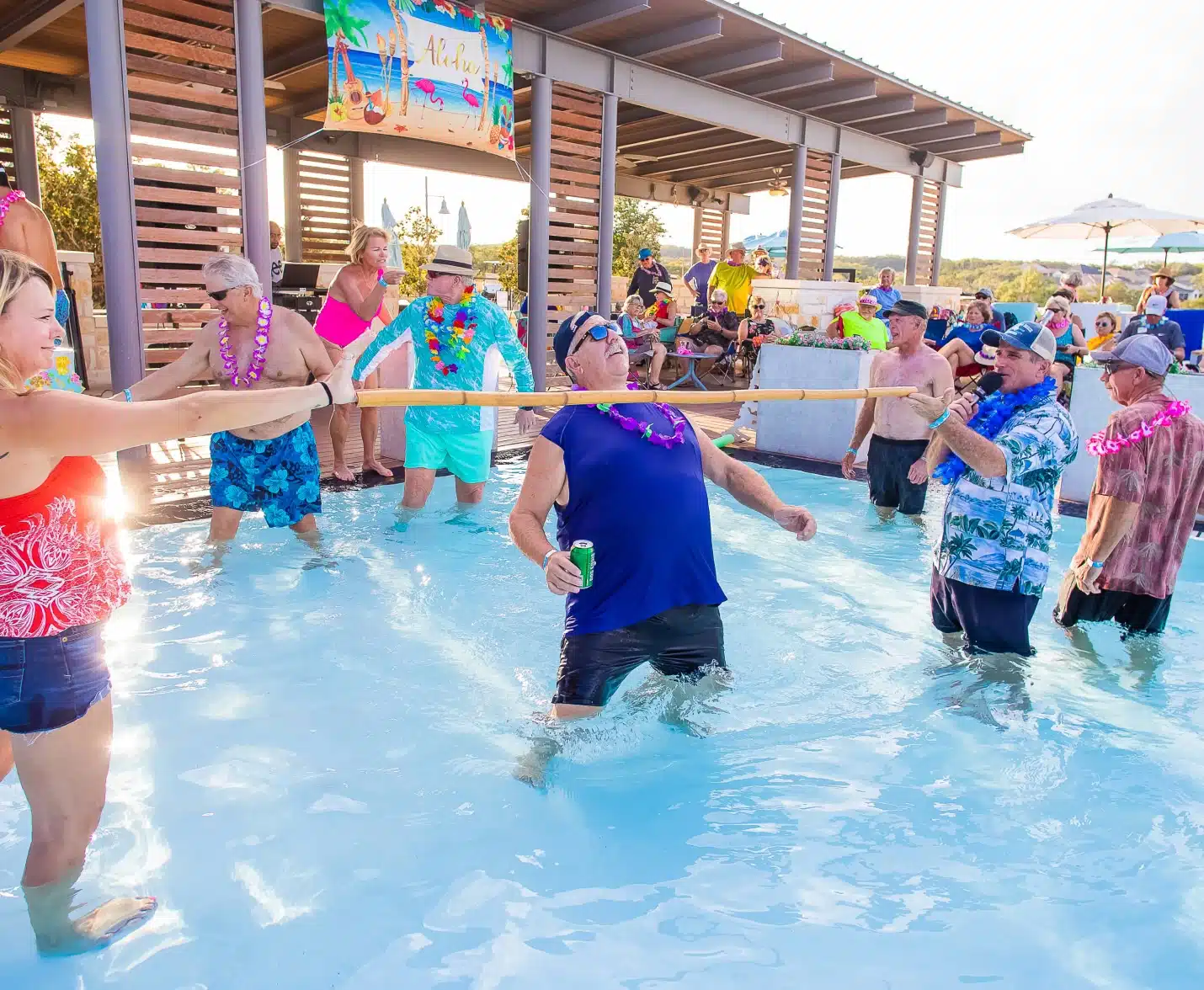 adults in resort style pool at kissing tree