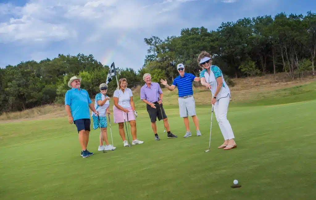 Kissing Tree neighbors celebrating on the 18-hole golf course in San Marcos, Texas