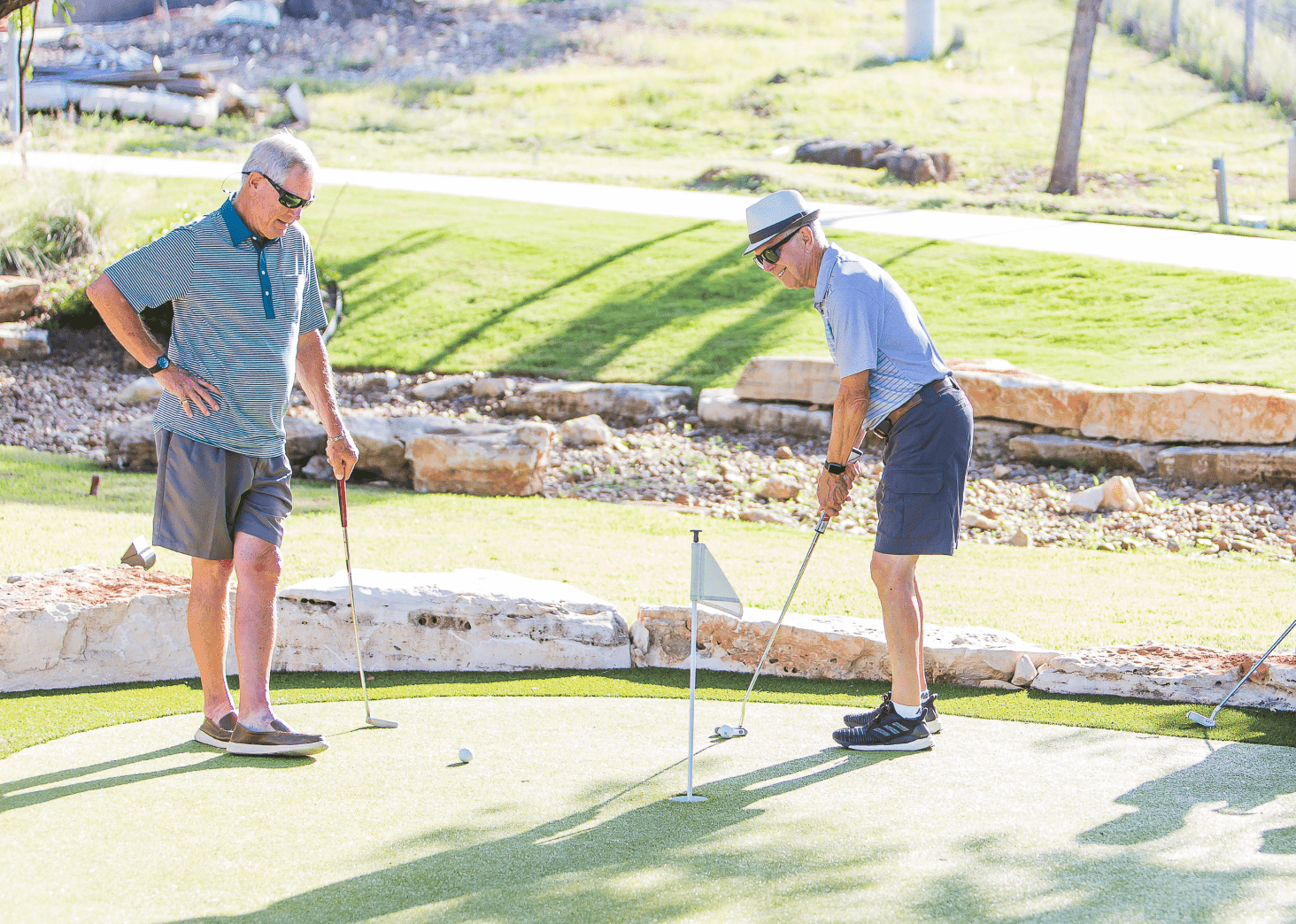 Golf Course - People Playing Hole in One